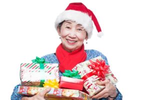 80 years old woman with presents