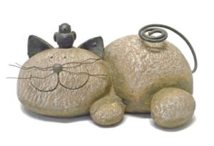 whimsical resting cat stone